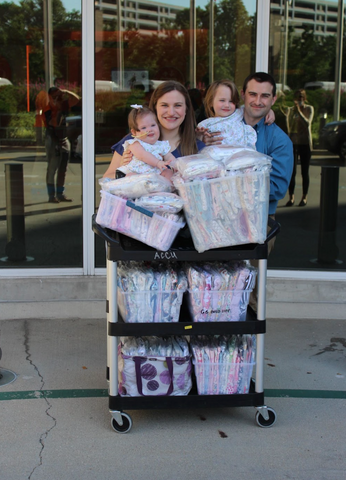 Meg Casey and her family help to facilitate the donation drop off