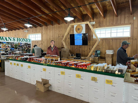 Swan’s Honey employees setting up our booth at this year’s Fryeburg Fair.