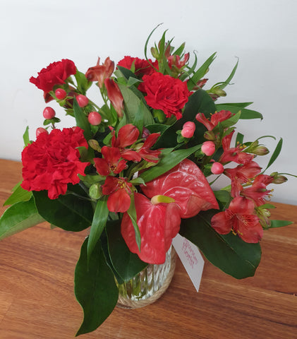 A bolder design made with red florals.