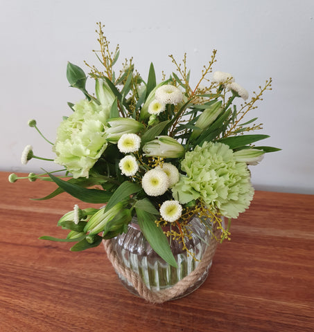 One of our small jars of joy in green & white florals.