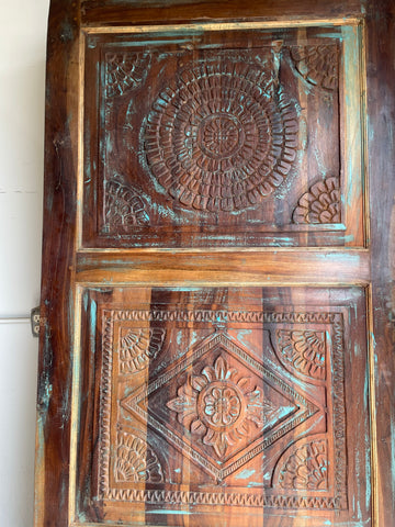 Organic design with doors with carvings inspired by nature create interiors are in harmony with the universe