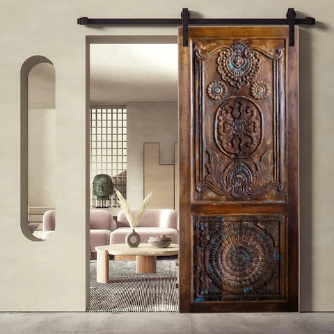 Artisan-Carved Sliding Barn Doors: Elevate Your Space with Vintage Elegance