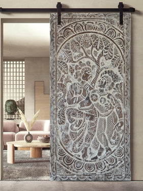 Artisan-Carved Sliding Barn Doors: Elevate Your Space with Vintage Elegance