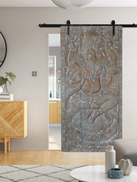 Artisan-Carved Sliding Barn Doors: Elevate Your Space with Vintage Elegance