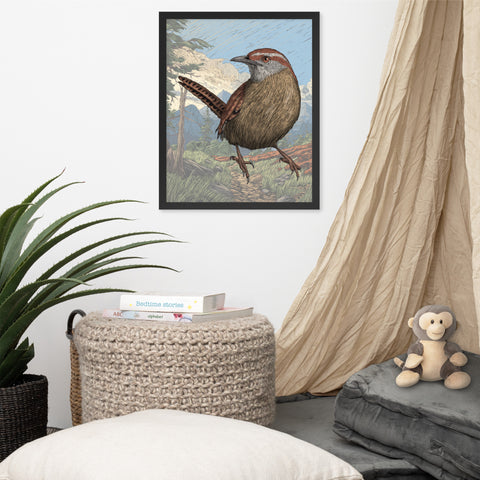 A framed art print of a wren in front of a faded background.  The print is hanging on a white wall with a plant off to the left, a curtain to the right, with a table with a teddy bear on top, and a wicker basket with a book on it.