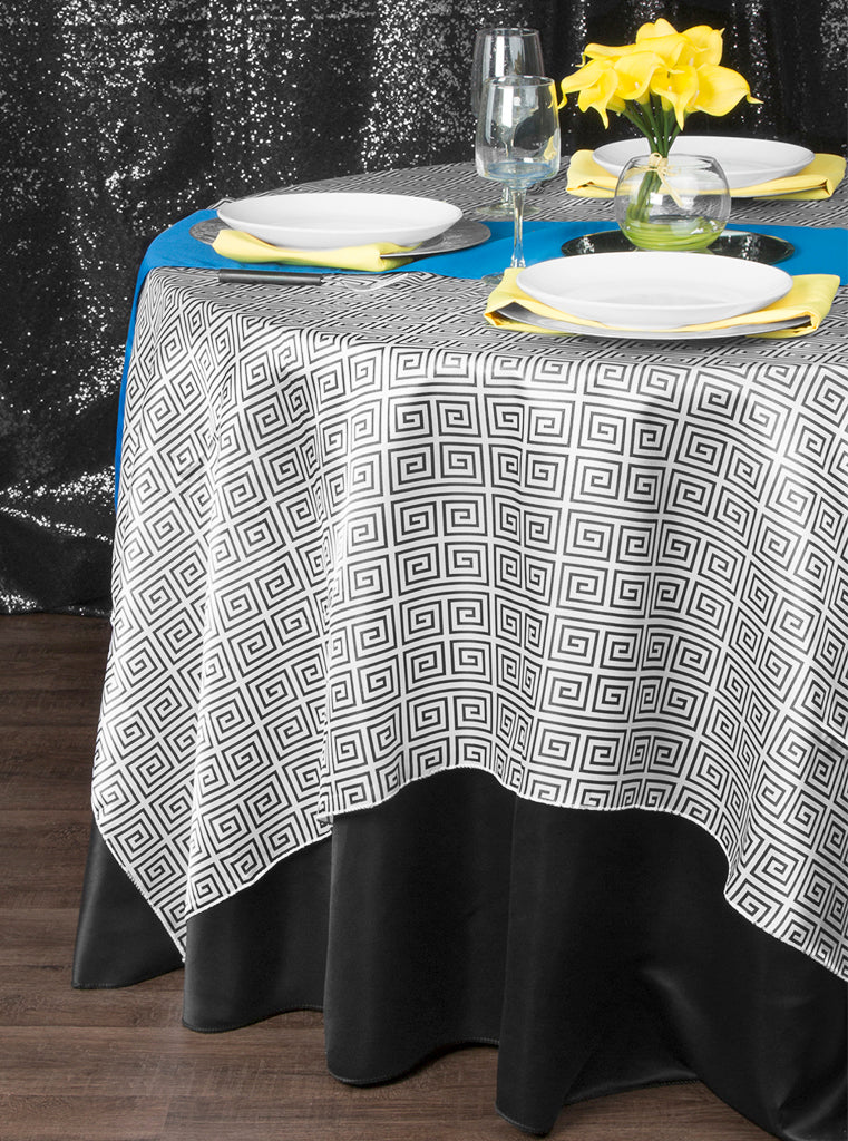 black table linens yellow napkins greek key