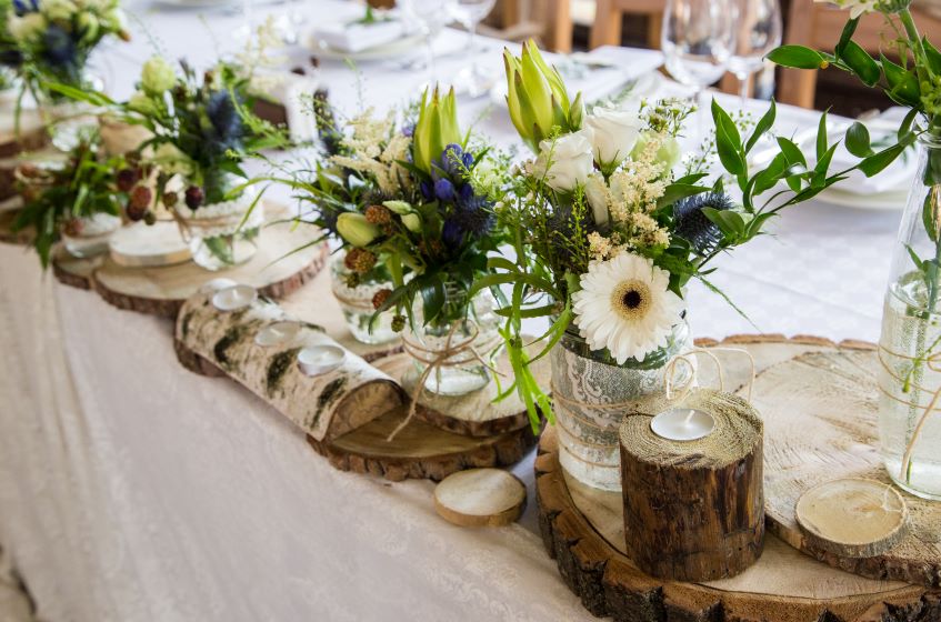 Centerpieces with Candles on Wood Slabs