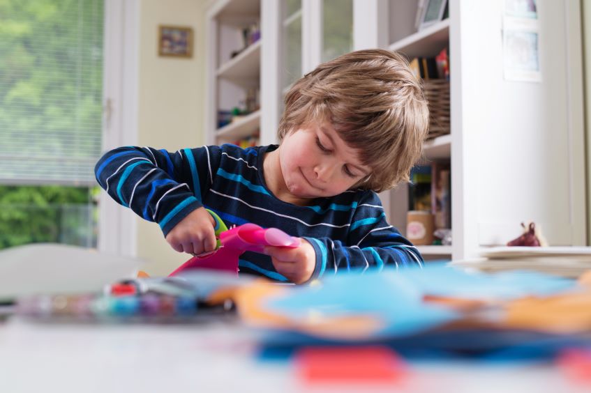 boy making crafts