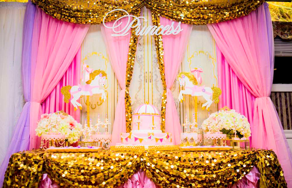 Princess carousel baby shower with pink, lavender, and gold sequins