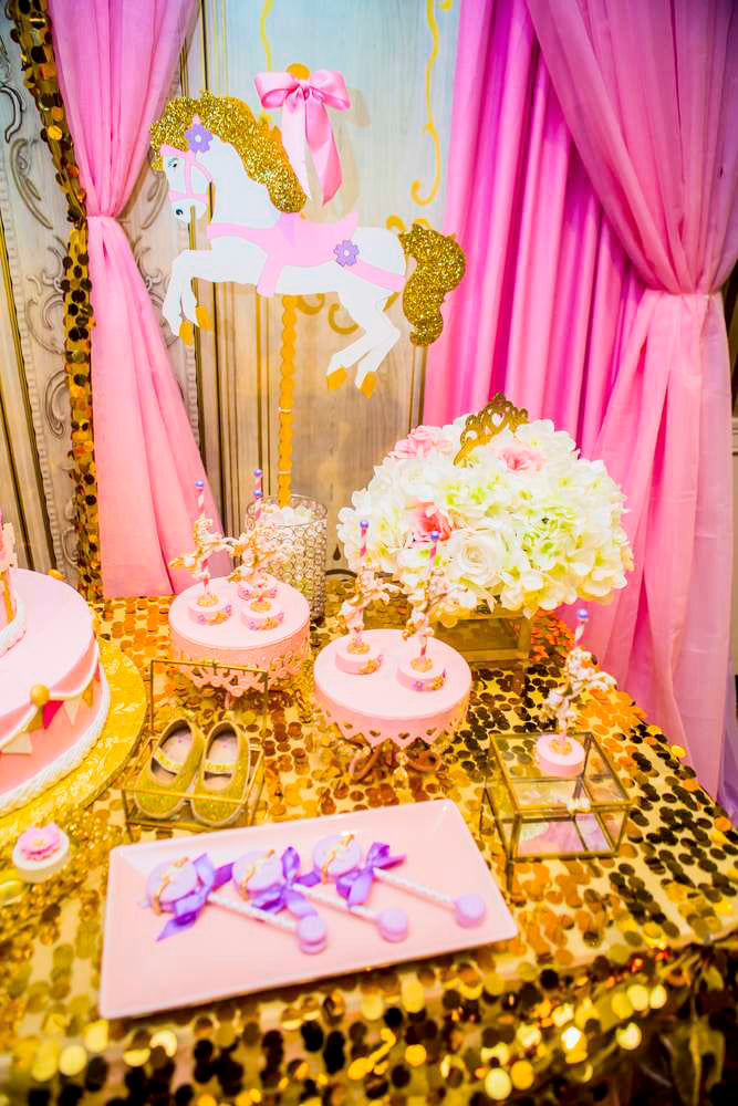 Princess carousel baby shower with pink, lavender, and gold sequins