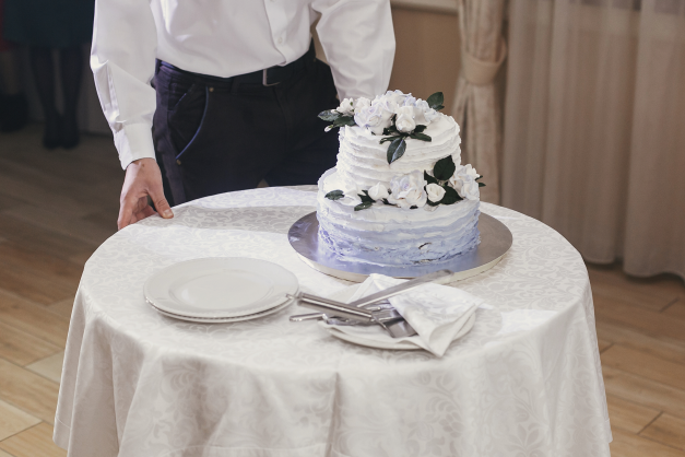 Round Tiered Cake on Cake Table with Sequined Tablecloth