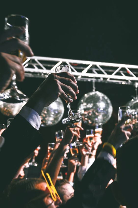 cheers at disco ball wedding