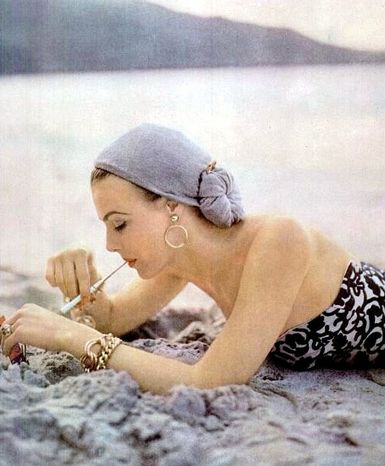 Lillian Marcuson in gold jewelry by Napier, photo by Milton Greene, 1951