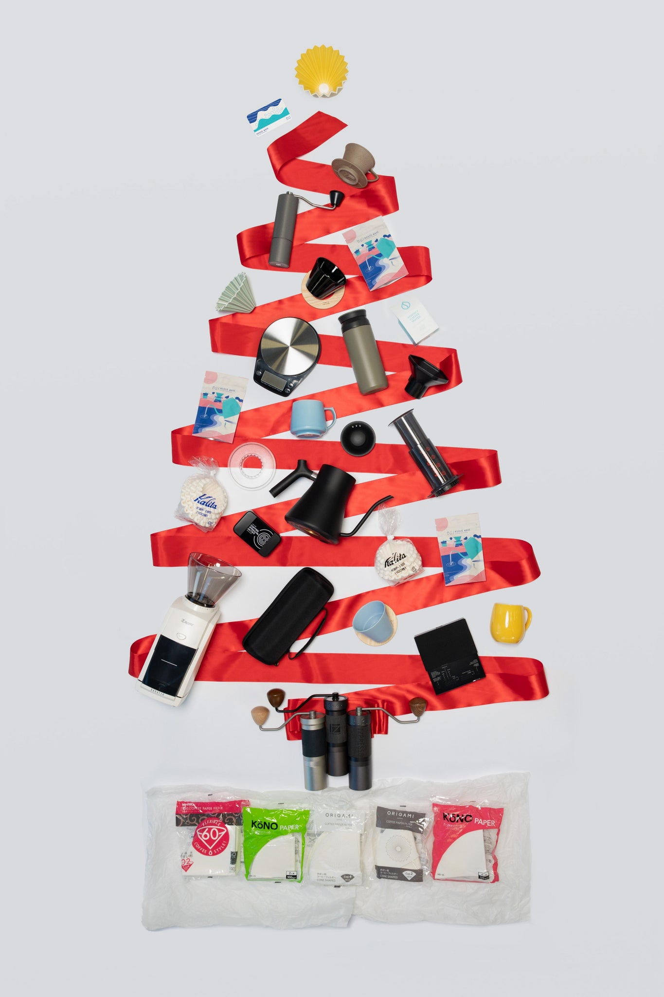 Flat lay of 25 gifts in Christmas tree shape from Rogue Wave Coffee