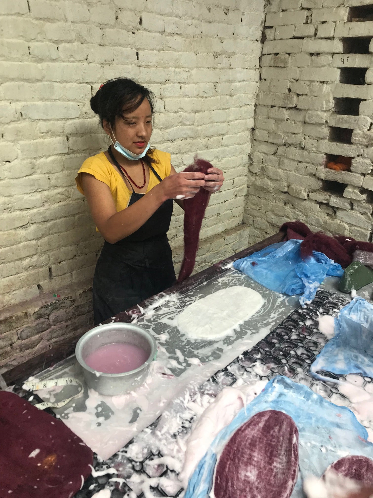 Artisans in Nepal making Egos Felted Wool Slippers