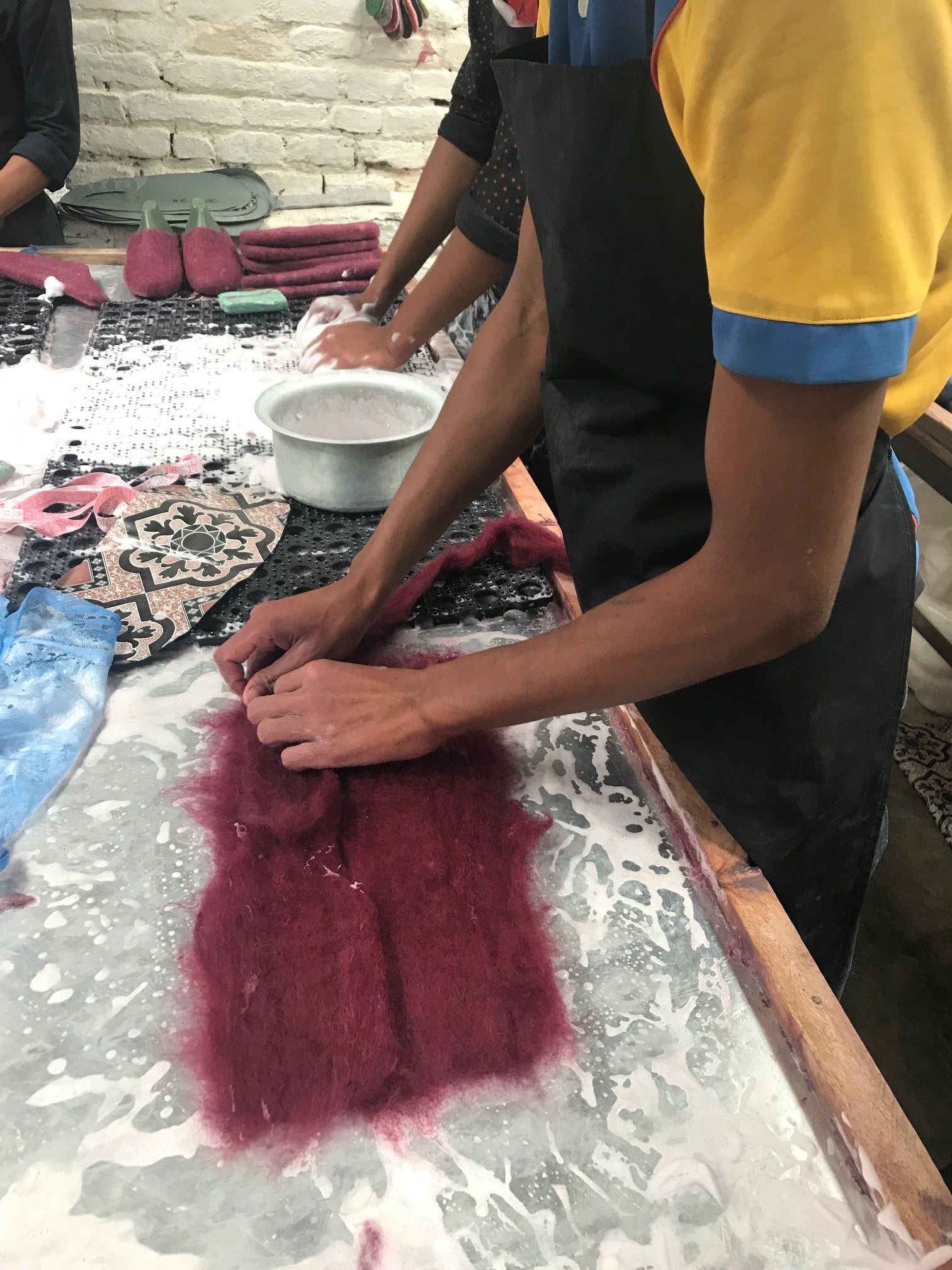 Artisans in Nepal making Egos Felted Wool Slippers