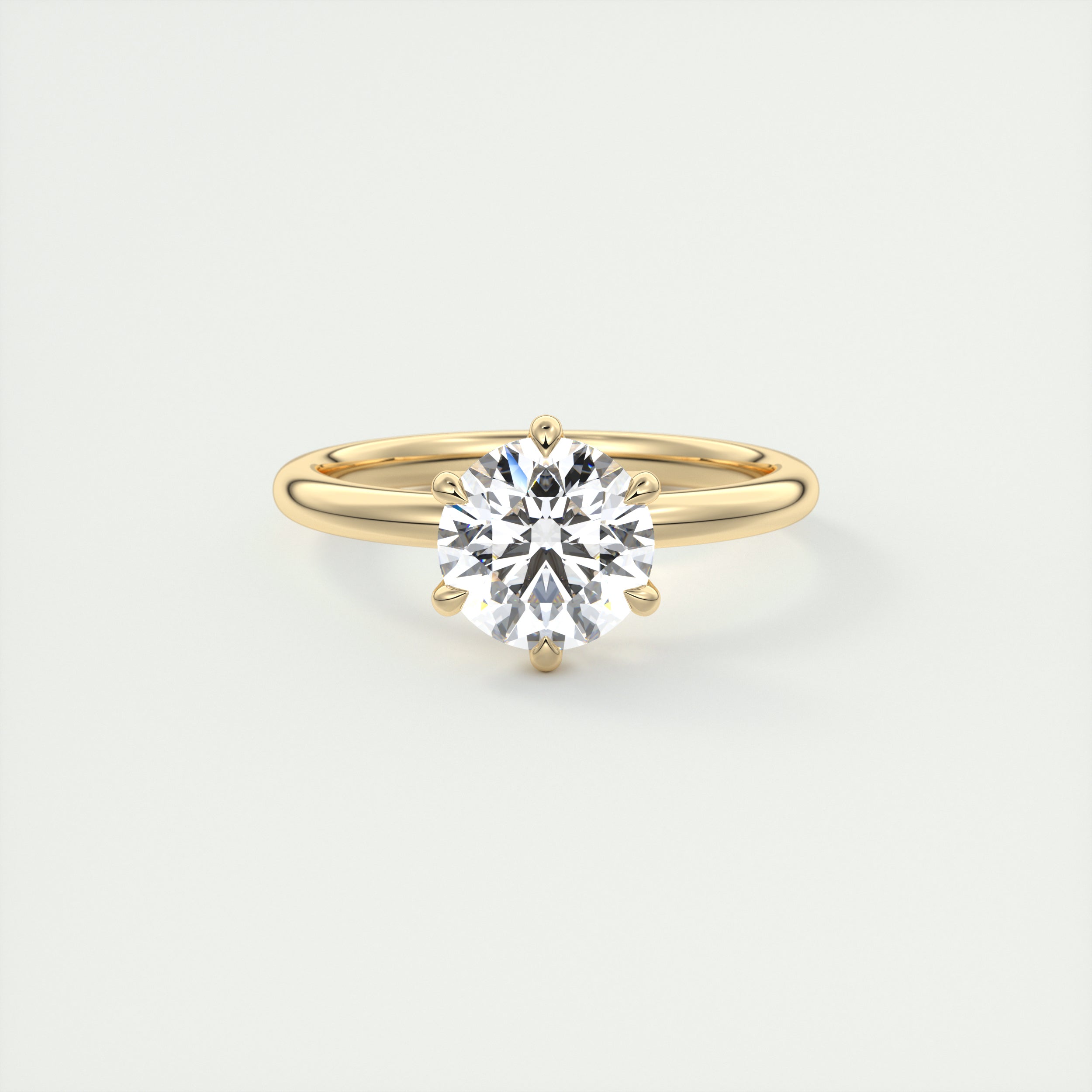 Frank Darling six prong round solitaire engagement ring with floral prongs and skinny band