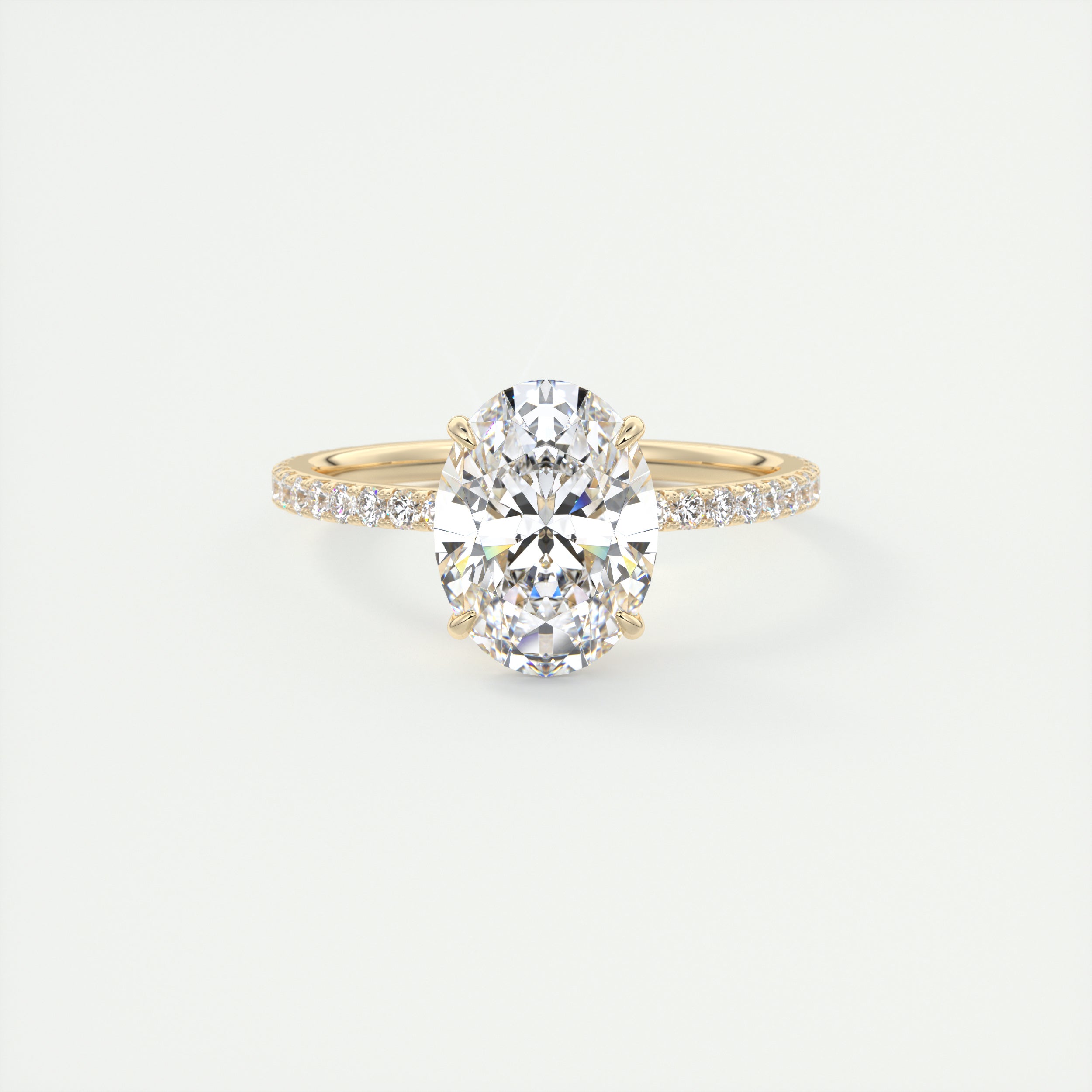 The Modern Oval Solitaire with French Pavé by Frank Darling