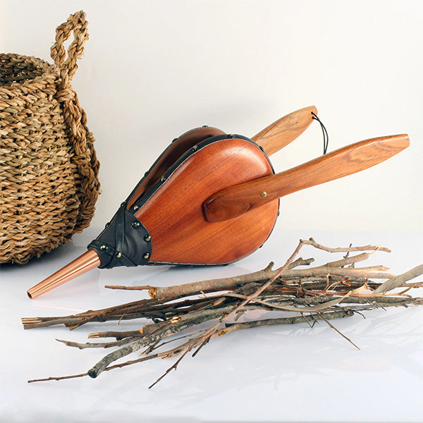 A beautifully handcrafted fire bellows made from fragrant and durable Red Cedar wood