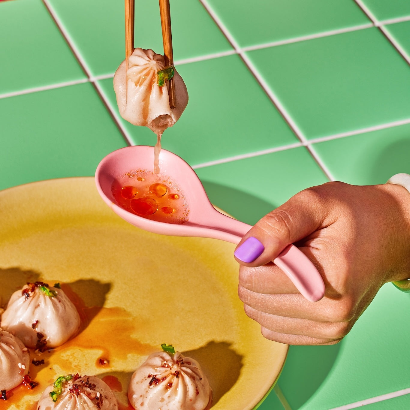 Taste a bit of the soup by nibbling the dumpling and pouring it out onto a spoon