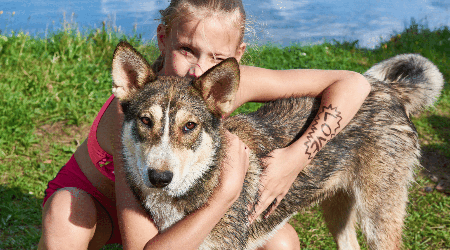 girl with a large breed dog