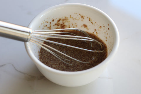 In a small bowl, combine the ground flaxseed and water. Whisk well and let it set for 5-10 minutes to give it time to thicken.