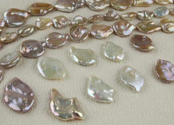 China freshwater lightweight coin pearls (leatherette nuclei)