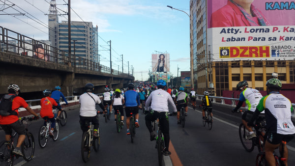 Cyclists along EDSA, Philippines during the Tour of the Fireflies 2014