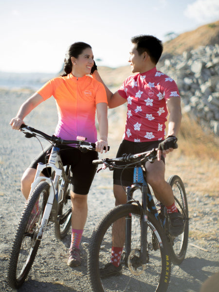 Cycling couple on mountain bikes