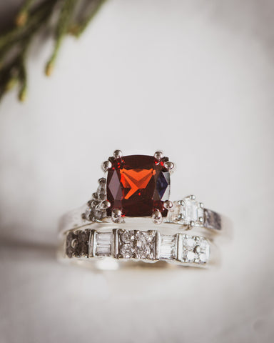 Diamond and garnet white gold engagement ring