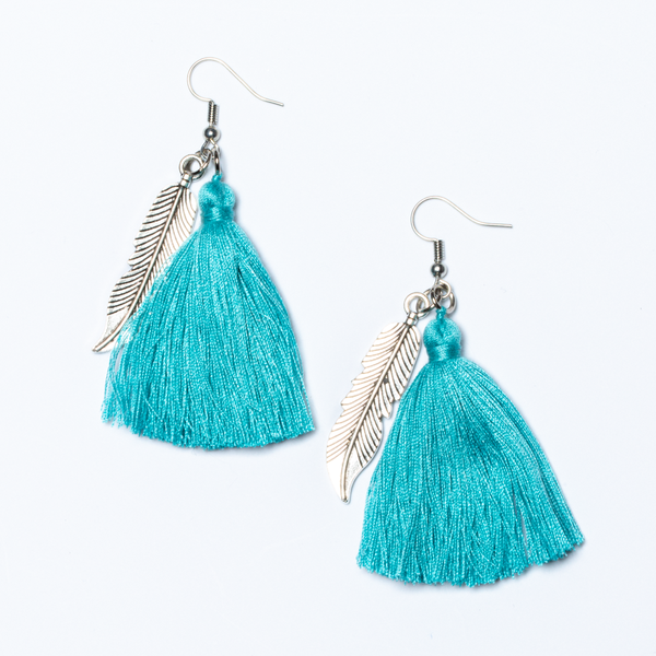 Turquoise Tassel with Leaf Charm Earrings - chiangmaicctv slow fashion bryn walker linen Hamilton sustainable fashion gifts sari not sari Hamilton Fair trade  Ethical  Artisan made  Zero waste  Up-cycled Slow Fashion  Handmade  GTA Toronto Copper Pure Upcycled vintage silk handmade recycled recycle copper pure silk travel clothing hamilton vacation cruisewear resortwear bathing suit bathingsuit vacation etsy silk clothing gifts gift dress top pants linen bryn walker alive intentions kaarigar elephants