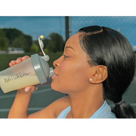 Woman-drinking-natural-protein-shake