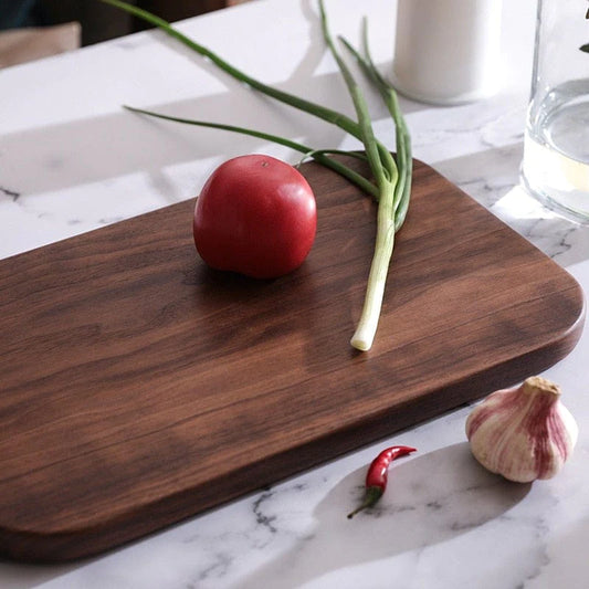 https://cdn.shopify.com/s/files/1/0043/1564/4004/products/Black-Walnut-Cutting-Board-Blackbrdstore-354_533x.webp?v=1673087944