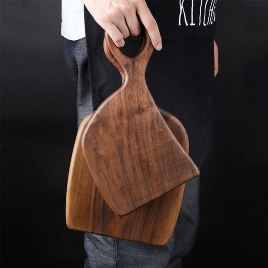 https://cdn.shopify.com/s/files/1/0043/1564/4004/products/Creative-Black-Walnut-Cutting-Board-Blackbrdstore-519_533x.jpg?v=1673120954