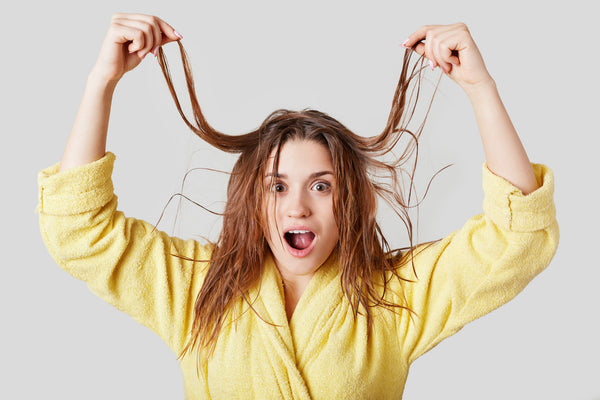 How to Wash Your Hair the Right Way, According to the Pros