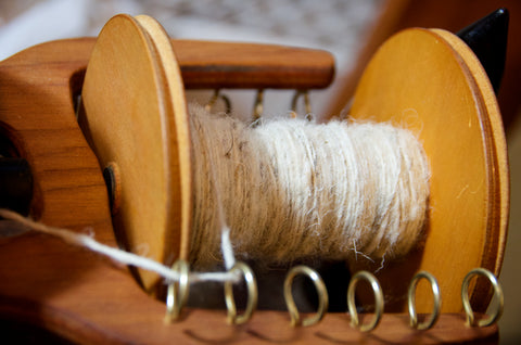 Peak District wool on the spinning wheel bobbin