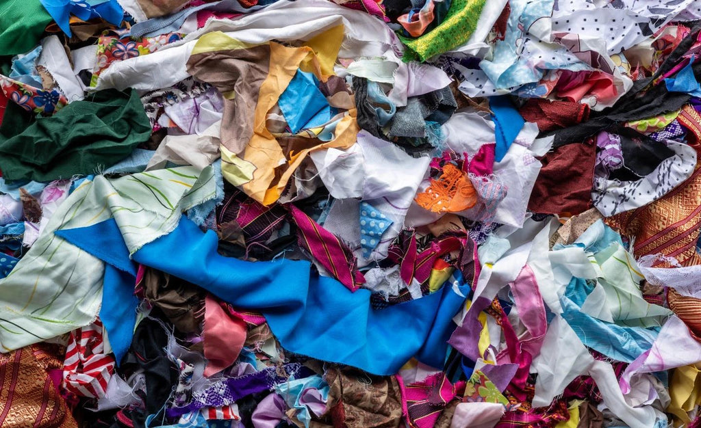Colourful textile scraps in a pile