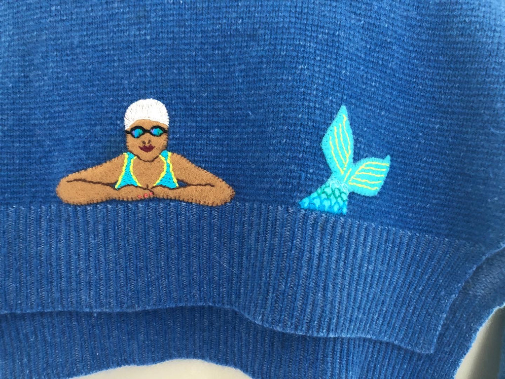 Mermaid design darned on blue jumper