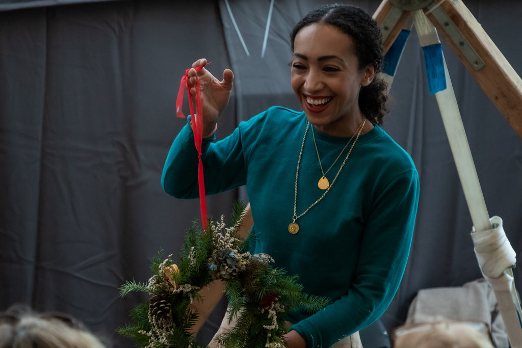 Hazel Gardner at Hemingway Design SAMPLE Christmas, leading a workshop on festive sustainable wreaths.