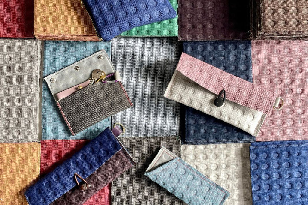 Sunglass cases and card holders made using Kvadrat sound insulation material samples