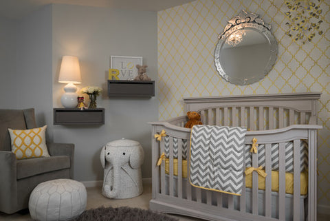 comfy chair by crib in baby room