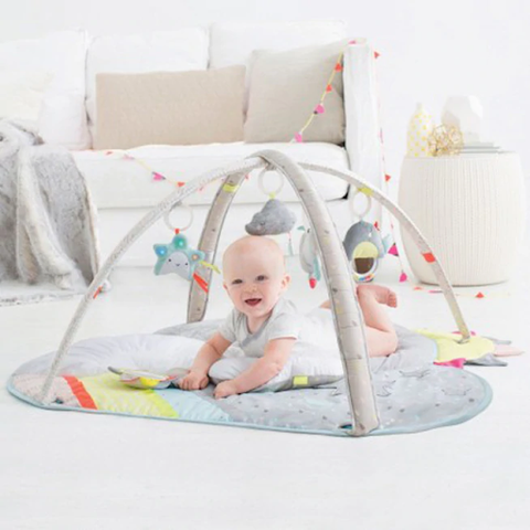 baby having tummy time on play mat