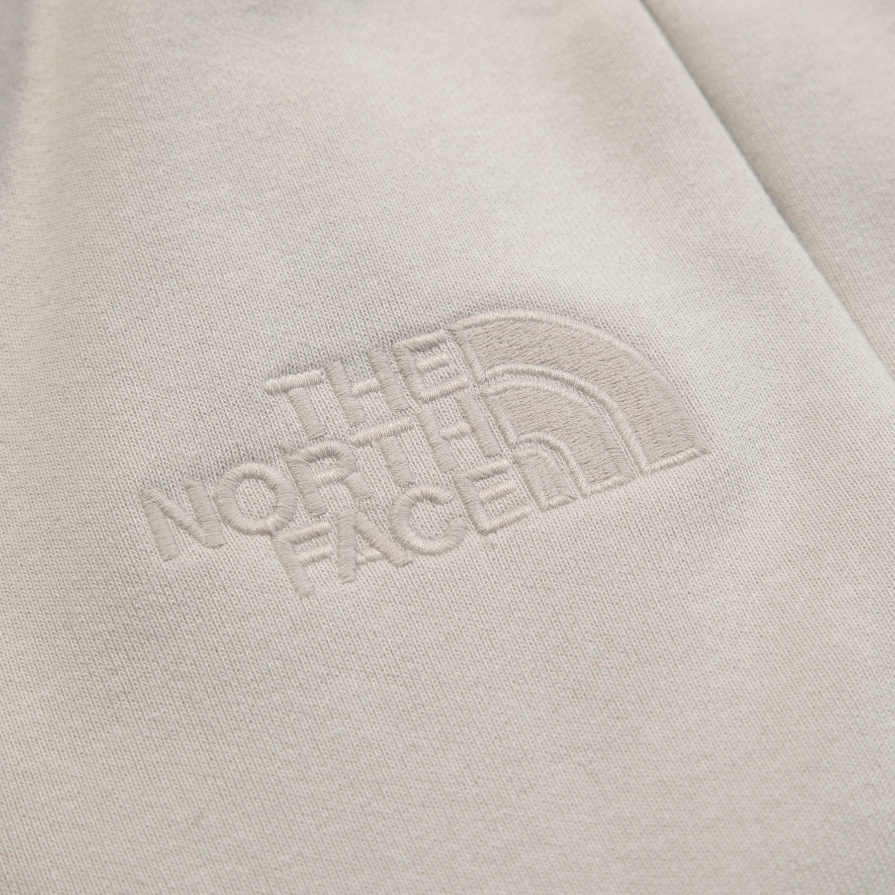 The North Face x KAWS Sweatpant (Moonlight Ivory)