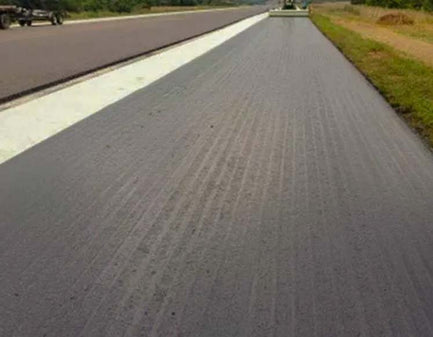 Laying the Paving Fabric on Road Project