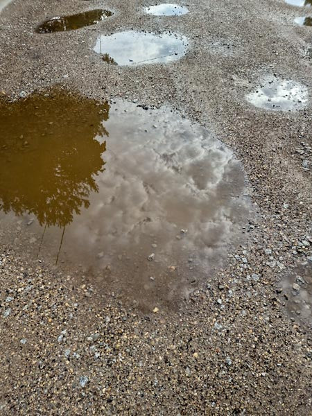 Potholes in Gravel Road