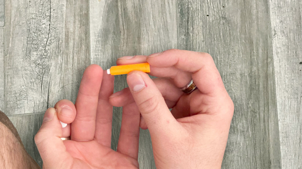 Poking finger with Painless Lancet from Pip Diabetes