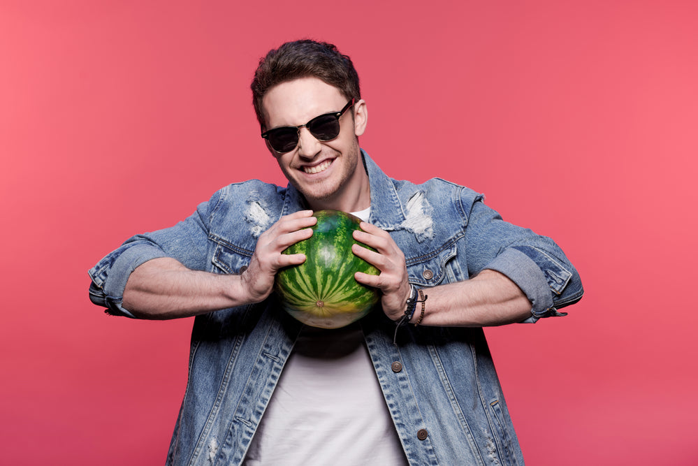 man holding watermelon