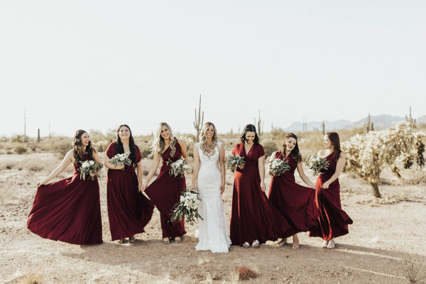 twobirds bridesmaids wearing burgundy ballgown 