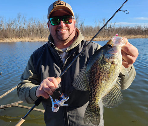 Joel Nelson with a spring crappie