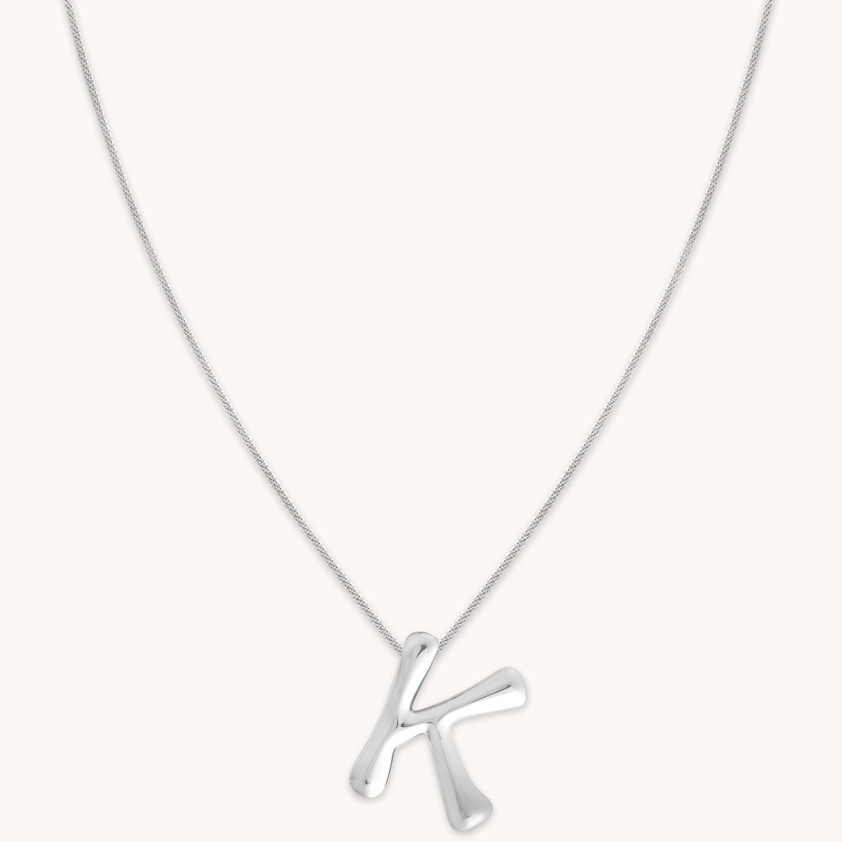 Astrid &amp; Miyu Initial Pendant Necklace K In Silver In Metallic